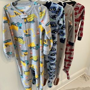 4 pairs of Truck Fleece Pajamas Size 2T-4T. Perfect for your Truck loving boy!